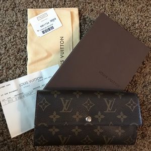 **Louis Vuitton Sarah Wallet**